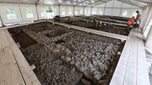 Archaeologists carefully excavate the remains of the Roman complex, revealing its intricate stone structures. Credit: ADA Zug / David Jecker.