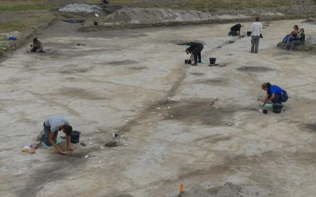 Archaeologists meticulously excavate the site, uncovering artifacts and mapping the village layout to understand its societal structure. (Credit: CNRS)