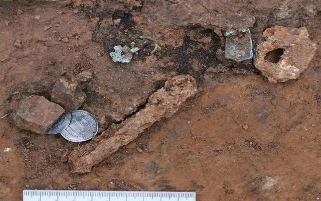 Artifacts including coins, bronze items, and other grave goods discovered at the Muromian burial site. (Credit: Institute of Archaeology of the Russian Academy of Sciences)