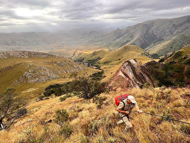 Ascending toward the Lion Cavern, the world’s oldest known ochre mine, situated in Eswatini’s Malolotja Nature Reserve on the fringes of the Ngwenya Iron Ore Massif.