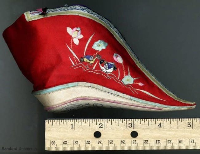 A vividly embroidered lotus shoe from the foot-binding tradition, showcasing the intricate craftsmanship and symbolism of beauty in ancient China. (Credit: Samford University)