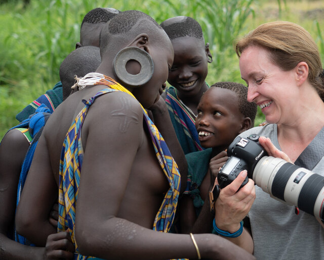 Behind-the-scenes glimpses from Ethiopia’s Omo Valley tribal photo tours reveal the captivating lives of the Suri Tribe. (Credit: Jayne Mclean) 