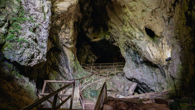 Beneath the castle, expansive caves weave a maze of subterranean passages waiting to be discovered. (Photo: Egotripone/Shutterstock.com)