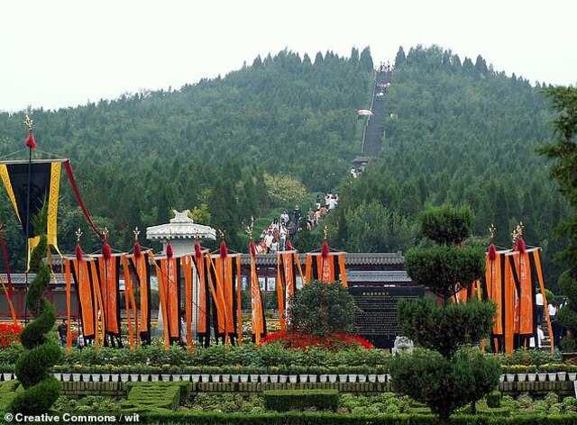 Hidden beneath a 249-foot-high pyramid-shaped mound (shown here), the tomb sits at the heart of a vast necropolis in Xi'an's Lintong District, guarded by the iconic Terracotta Army.