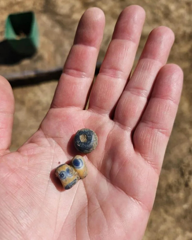 Intricate glass beads discovered at the site, reflecting ancient craftsmanship.