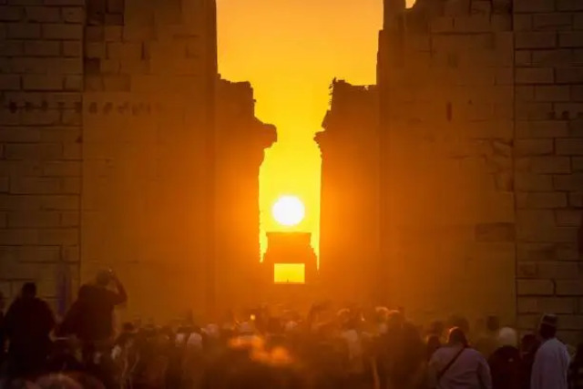 Marvel at the captivating alignment of the sun during the Winter Solstice at Karnak.