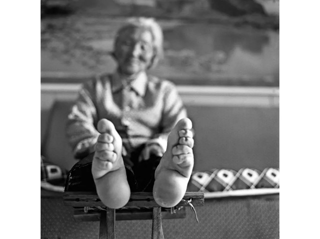 Photographer Jo Farrell documented some of the last women in rural China with bound feet for her series Living History, including 88-year-old Zhang Yun Ying. (Credit: Jo Farrell)