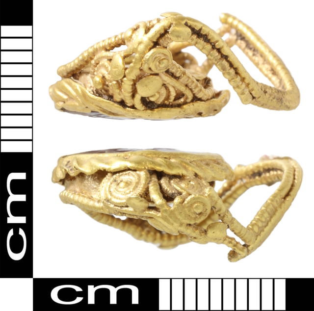 Side profile of the gold Diana Venatrix ring, highlighting its elaborate beaded wire design and intricate goldwork from the late Roman period.