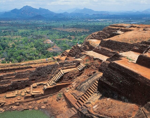 Sigiriya masterfully combines utility and artistry, with its elaborate, symmetrical royal gardens designed to provide fresh water while celebrating beauty.