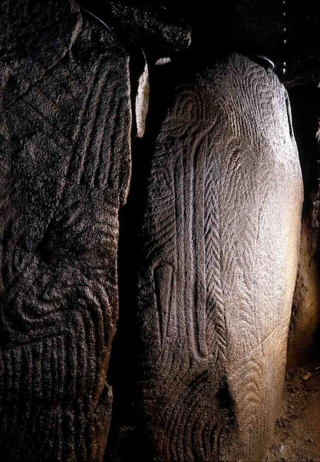 Some of the remarkable carved stone slabs discovered within the Gavrinis Passage Tomb display intricate designs and symbolism.