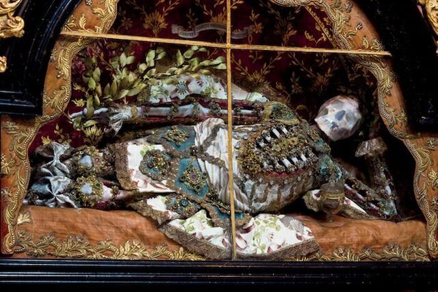 St. Friedrich at the Benedictine abbey in Melk, Austria, reclines gracefully while holding a laurel branch, symbolizing victory and eternal life. (Copyright: Paul Koudounaris)