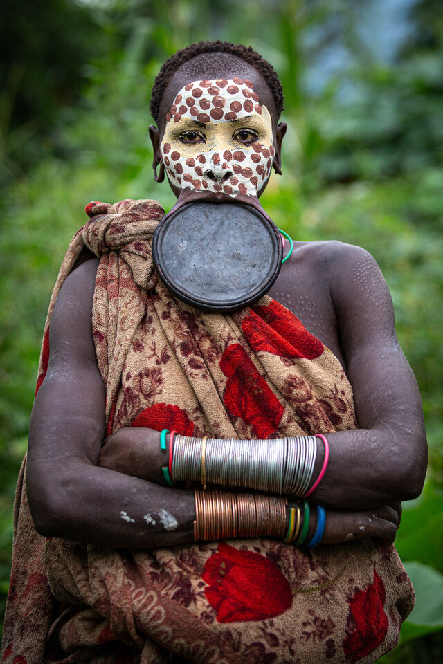 The Suri Tribe, a subgroup of the larger Surma tribe that includes the Mursi, remains one of the last African communities to practice the tradition of wearing lip plates. (Credit: Jayne Mclean) 