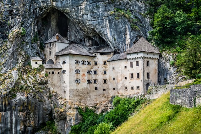 Rebuilt in the 16th century, Predjama Castle now boasts a striking Renaissance aesthetic. (Photo: Tomas Zavadil/Shutterstock)