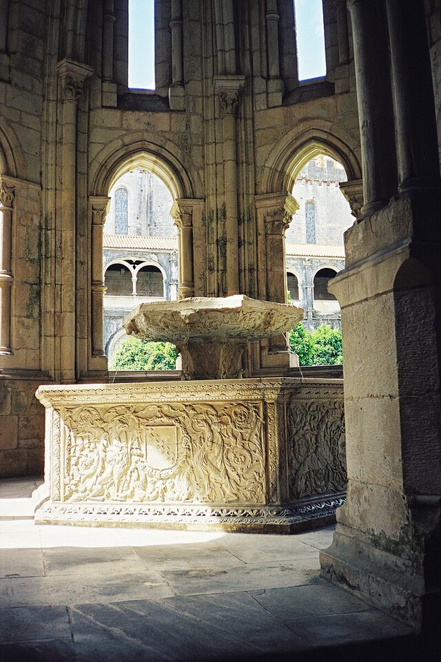 The elaborately decorated fountain basin within the Gothic Fountain Hall, a unique blend of utility and artistry.