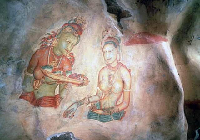 A close-up of a Sigiriya fresco, showcasing two women holding offerings, symbolizing the rich cultural and religious heritage of the ancient Sinhalese kingdom.