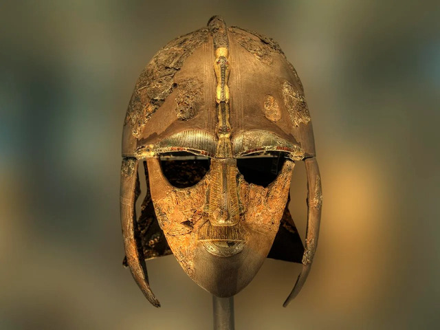 The iconic Sutton Hoo helmet, unearthed from an Anglo-Saxon ship burial, is now on display at the British Museum. (Credit: Neil Howard, CC BY-NC 2.0, modified by Archaeology News)