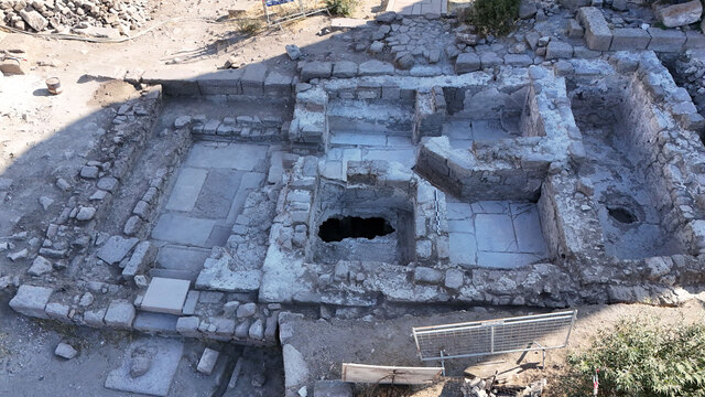 The intricate layout of the Ottoman bath in Assos, including its water channels and changing rooms, coming to light after centuries.