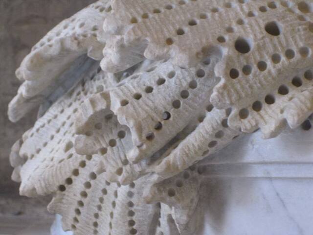 The lace appears so delicate and intricate that viewers often mistake it for real fabric. Yet, every thread, fold, and pattern is painstakingly sculpted from marble.