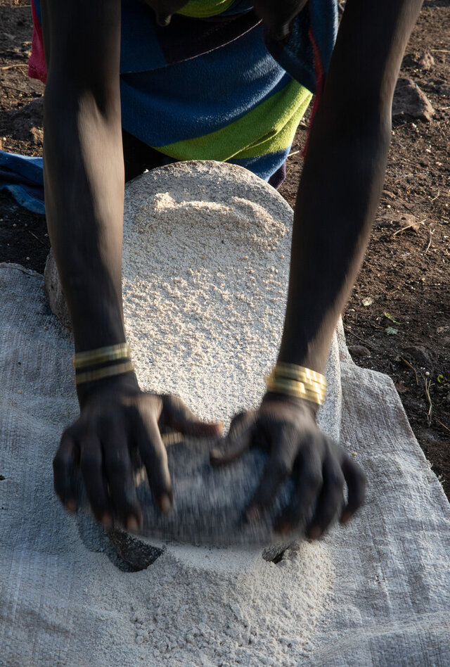 The women take pride in preparing their own food, showcasing their self-reliance and culinary traditions. (Credit: Jayne Mclean) 