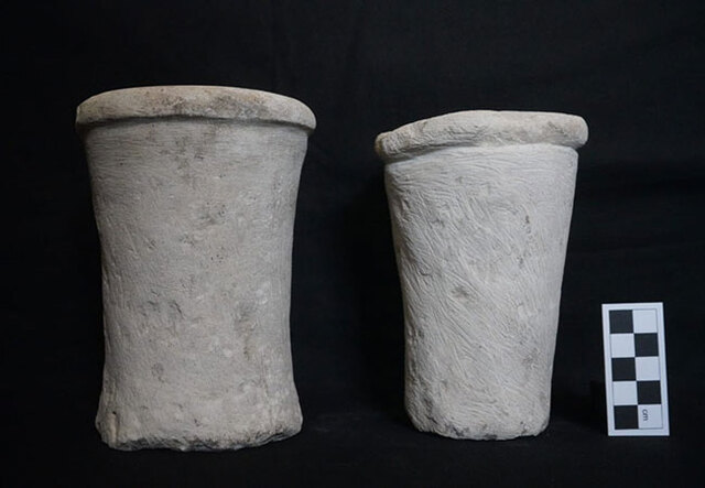 Two alabaster cylindrical vessels from the late 2nd or early 3rd Dynasty, found near the mastaba tombs in Saqqara. Credit: Ministry of Tourism and Antiquities of Egypt.