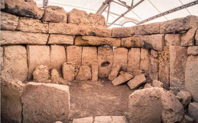 Malta’s iconic Hagar Qim megalithic site, a stunning temple complex from ancient times. (Jaroslav Moravcik/Adobe Stock)